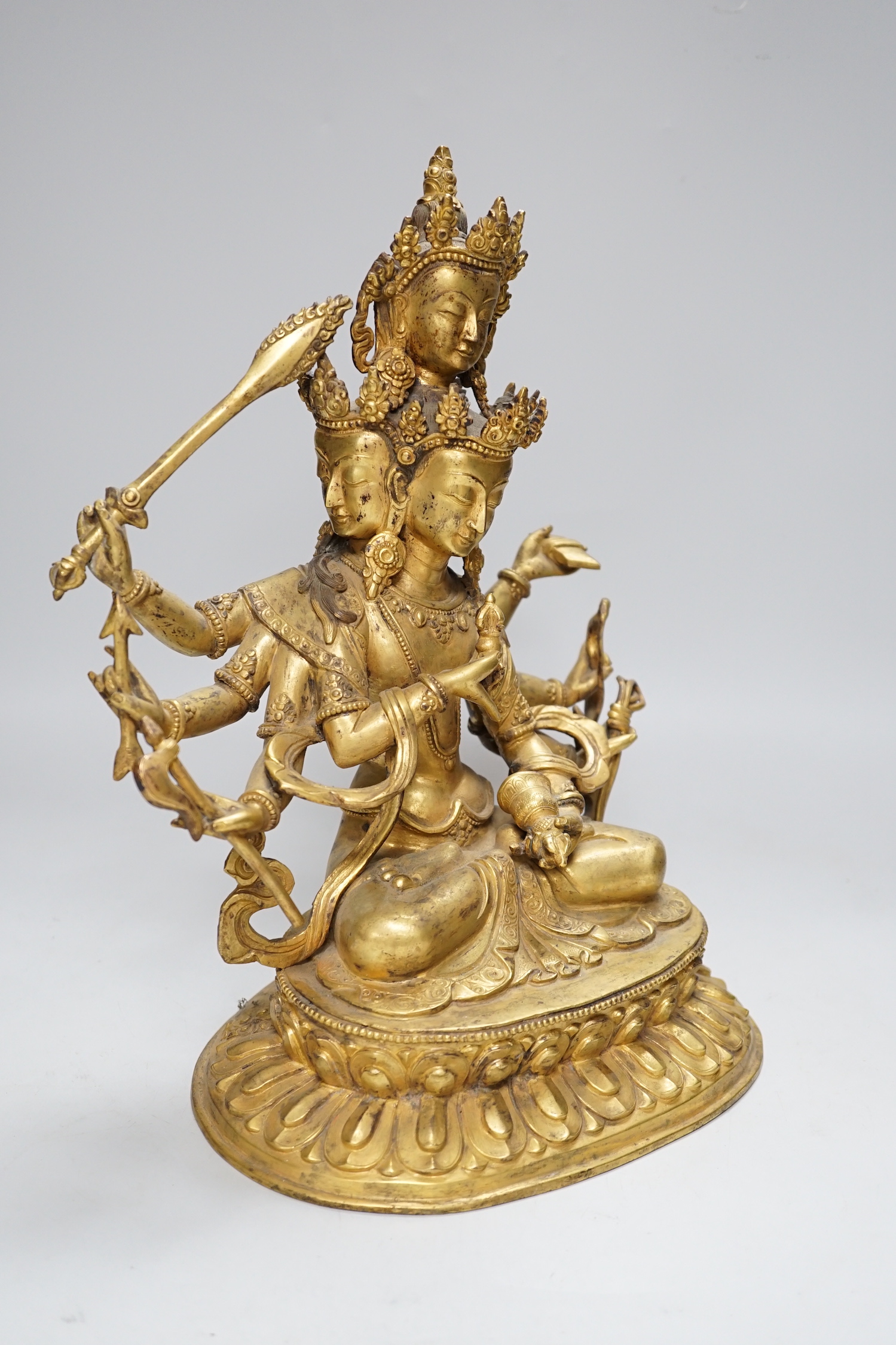 A Sino Tibetan gilt bronze figure of Avalokiteshvara, 34cm high